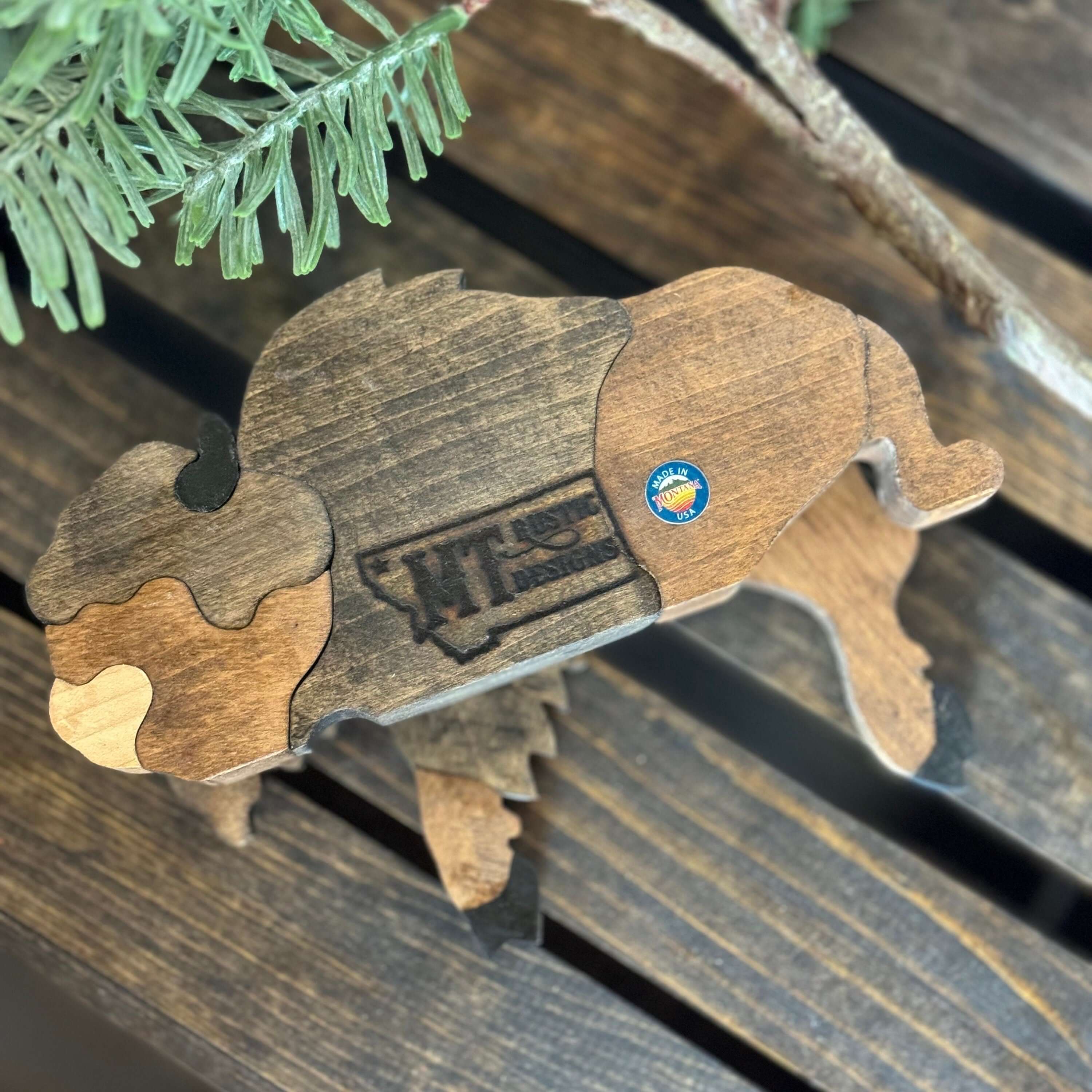 Rustic Wooden Bison Shelf Sitter – Farmhouse & Western Home Decor on a wooden surface with greenery.